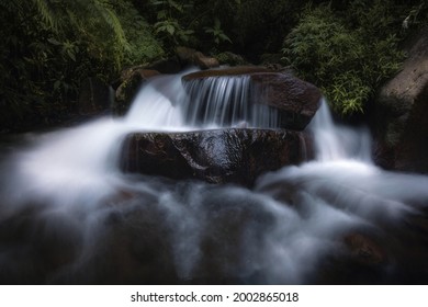 nature waterfall in trawas, mojokerto, indonesia - Shutterstock ID 2002865018
