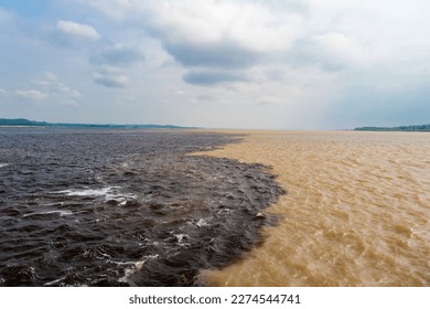 nature waterscape of amazon and rio negro rivers, brazil. photo of nature waterscape meeting waters. - Shutterstock ID 2274544741