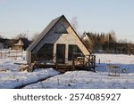 Nature in winter under snow during the day.
