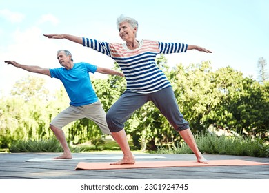 Nature, yoga and senior couple doing outdoor exercise, retirement workout or fitness performance. Wellness, freedom and elderly man, woman or people doing pilates pose, training or health balance - Powered by Shutterstock