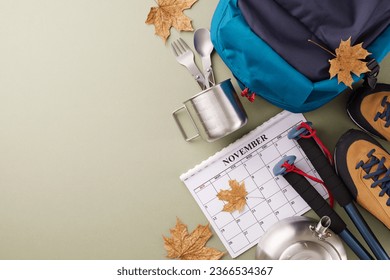 Nature-focused tourism for a weekend escape. Top view flat lay of calendar, metal utensils, hiking shoes, rucksack, trekking sticks, autumn leaves on green background with promo placement - Shutterstock ID 2366534367