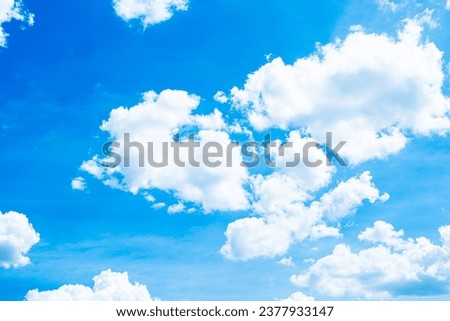 Nature's Canvas: White Clouds Adorn the Summer Sky