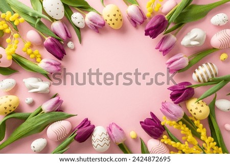Nature's Easter Harmony: Overhead shot of circular layout with ceramic bunnies, eggs, fresh flower blossoms on pastel pink background. Enchanting setting with blank canvas for text or promo content