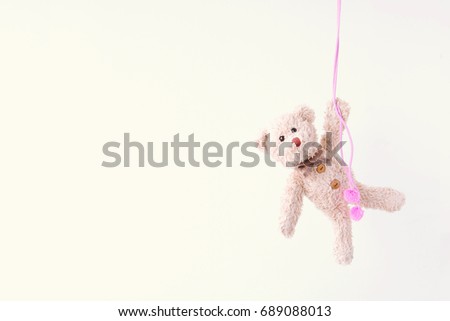 Naughty teddy bear is hanging on the pink line,Everywhere animal is happy 