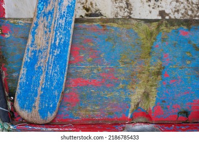 Nautical Background Part Of An Old 
Wooden Boat Rear Bench And Paddle