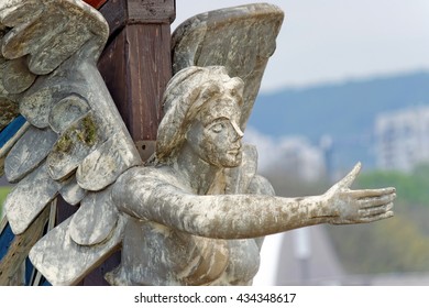 A Nautical Figurehead Of A Female Angel. Carved Figure Made From Wood Mounted On A Bow Of A Pirate Ship Replica.