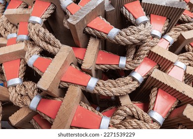 Nautical rope ladder twisted into a roll, close-up. Pilot storm ladder. - Powered by Shutterstock