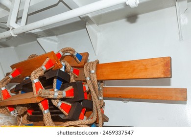 Nautical rope ladder twisted into a roll, close-up. Pilot storm ladder. - Powered by Shutterstock