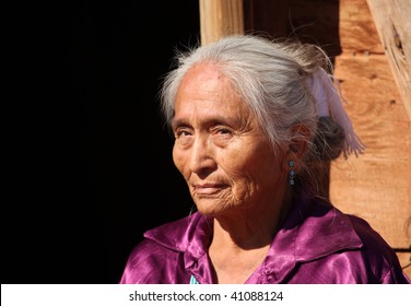 Navajo Elderly Woman Outdoors In Bright Sun