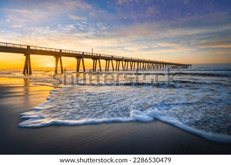 The Navarre Beach pier's is famous for is being the longest fishing pier in Florida, stretching 1,545 feet long and towering 30 feet above the water.
