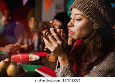 Navidad Mexicana, Woman Drinking Ponche Navideño Celebrating A Posada In Christmas Mexico