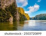 Navigating through the Iron Gates, a stunning gorge on the river Danube., forming the boundary between Serbia and Romania.