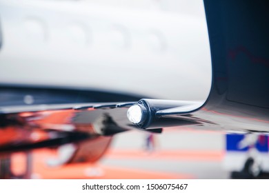 Navigation Light On The Wing Of Jet Airplane In Airport