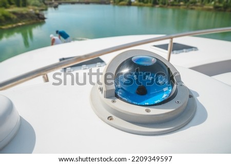 Navigational Compass On Boat at day. 