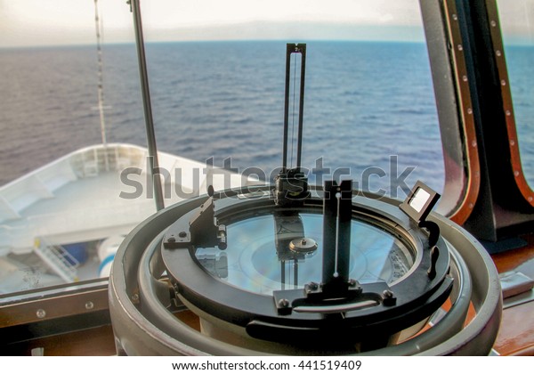 Navigational equipment from a big ship with\
the sea in the\
background