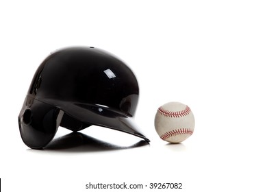 A Navy Blue Baseball Helmet And Baseball On A White Background