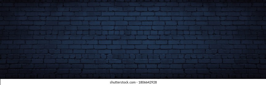 Navy blue brick wall wide texture. Dark indigo masonry large long background. Gloomy night backdrop