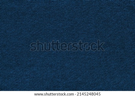 Navy blue cotton fabric pattern close up as background