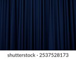 Navy blue curtain with many folds background texture