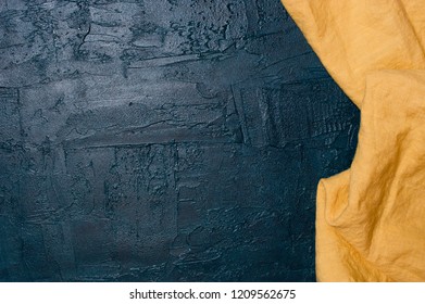 Navy Blue Kitchen Background With Yellow Napkin, Copy Space