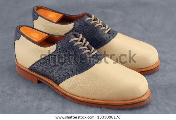 navy blue saddle shoes