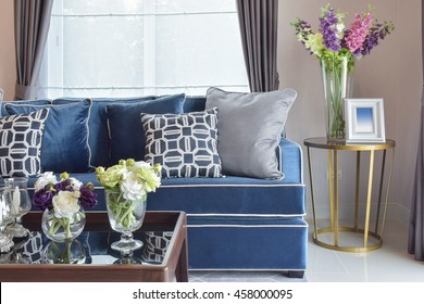 Navy Blue Modern Classic Sofa Set With Beautiful Flower Vases In Nice Living Corner