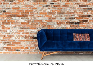 Navy Blue Sofa And Ethnic Pillow On It