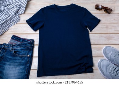 Navy Blue Unisex Cotton T-shirt Mockup With Grey Trainers And Jeans. Design T Shirt Template, Tee Print Presentation Mock Up