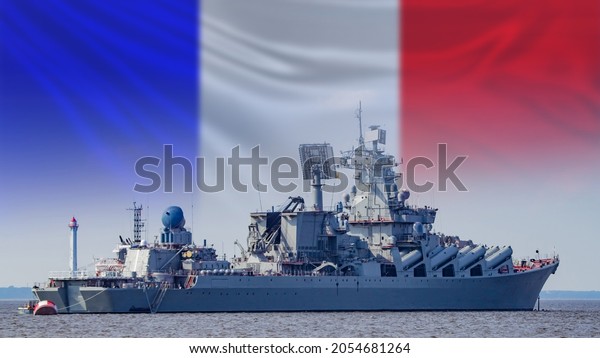 Navy France.\
Flotilla of French Republic. Side view of missile cruiser. Warship\
against background of flag of France. French navy. Weapons of Army\
France. Warship at sea or\
ocean.