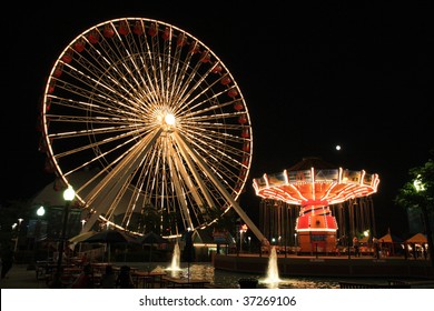 Navy Pier Amusement Park With Rides At Night In Chicago