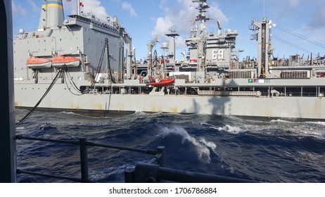 Navy Ship Refueling At Sea