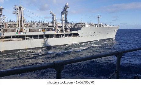 Navy Ship Refueling At Sea