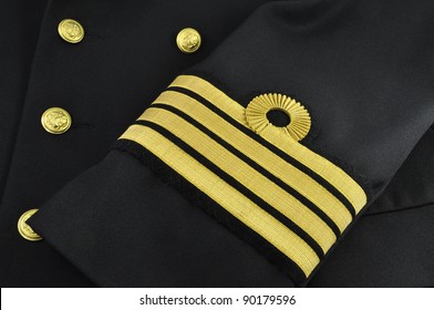 Navy Uniform With Captain Rank On A Sleeve