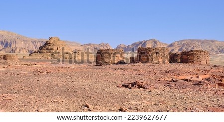 Nawamis - circular prehistoric stone tombs located in the Sinai desert of Egypt. Archaeological site with mysterious Nawamis buildings.