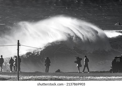 Nazare, Portugal: January 8 2022: People Are Watching The Nazare Surfing Challenge