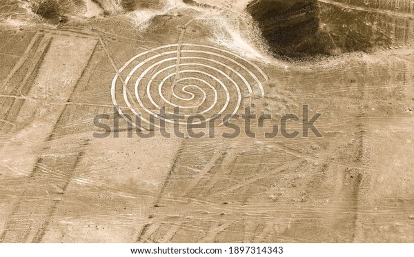 Nazca lines drawing geoglyph of the spiral, Nazca\
desert, Peru.