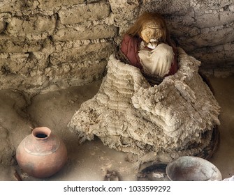 Nazca Mummy With Pottery At The Cemetery Of Chauchilla Near Nazca (Peru)