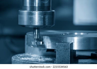 The NC Milling Machine T-slot Cutting The Metal Parts. The Shop Floor Operation By NC Milling Machine.