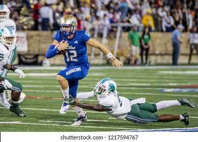 NCAA Football Tulane Vs Tulsa, Tulsa, USA - 27 Oct 2018: Tulsa Quarterback (12) Seth Boomer Keeps The Ball  During Game Between Tulane Uni. Green Tide And Uni. Of Tulsa Golden Hurricane.