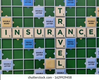 NDelhi, India, 2020
Scrabble Tiles Used To Spell The Words Travel Insurance On The Scrabble Game Board. Health  & Travel Insurance Are Popular Nowadays Due To Coronavirus (Covid-19) Disease Pandemic