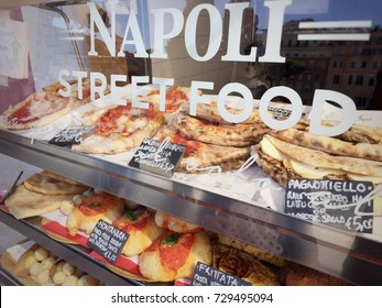 Neapolitan Street food stand. Calzone fritto, Pagnottiello and Pizza among the traditional dishes offered for sale
