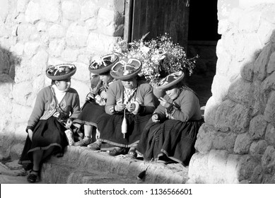 NEAR CUSCO PERU-NOVEMBER 15 2010: Quechua Women Dressed In Traditional Clothing.The National Rural Poverty Rate Is Over 50 Per Cent.