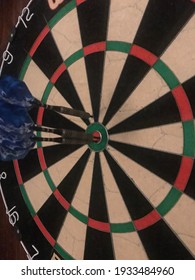 Near Miss Of Bullseye On Dart Board