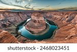 Near Page, Arizona, is a stunning horseshoe-shaped meander of the Colorado River. This iconic natural wonder, part of the Glen Canyon National Recreation Area, offers breathtaking views.