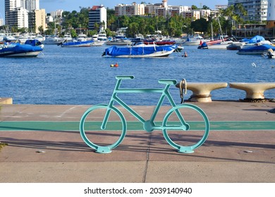 Near to the sea, Bicycle-shaped bicycle station on the fisherman's walk-in Acapulco, Mexico