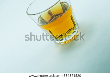 Similar – Image, Stock Photo a small glass of coffee and a white flower on a walnut table