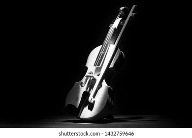 A Neat Close Up Of A Model Violin Using A Single Light Source. 