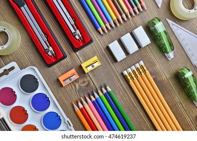 Neatly Arranged Brand New School Supplies Background