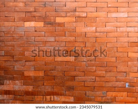 neatly arranged red or terracotta bricks