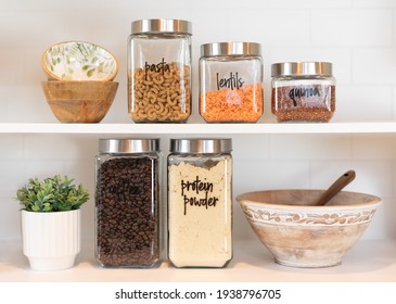 Neatly Labeled Food Ingredients On The Kitchen Shelf